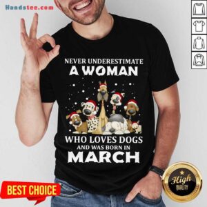 Premium Never Underestimate A Woman Who Loves Dogs And Was Born In March Christmas Shirt