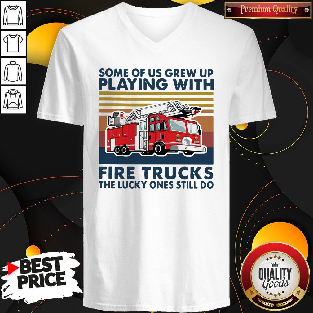 some-of-us-grew-up-playing-with-fire-trucks-the-lucky-ones-still-do-vintage-v-neck.jpg