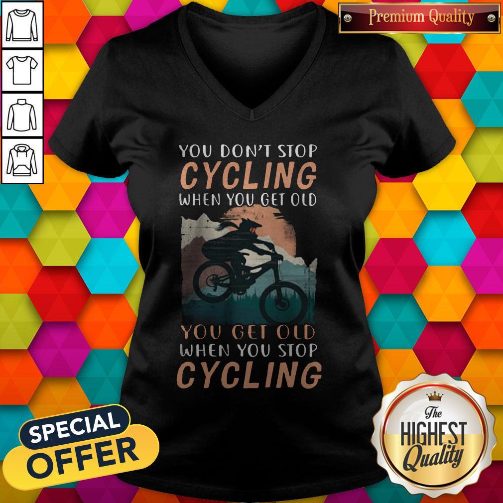 you-dont-stop-cycling-when-you-get-old-you-get-old-when-you-stop-cycling-v-neck.jpg