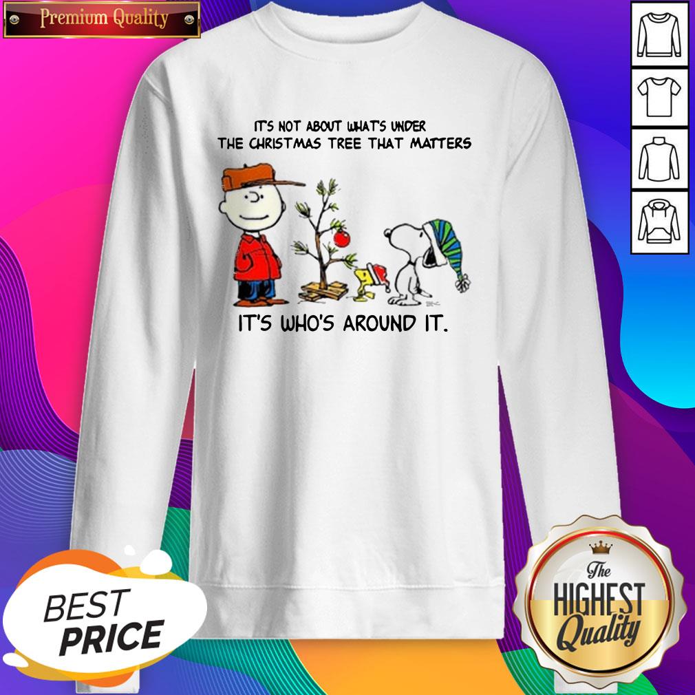 the-peanuts-snoopy-its-not-about-whats-under-the-christmas-tree-that-matters-its-whos-around-it-sweatshirt.jpg