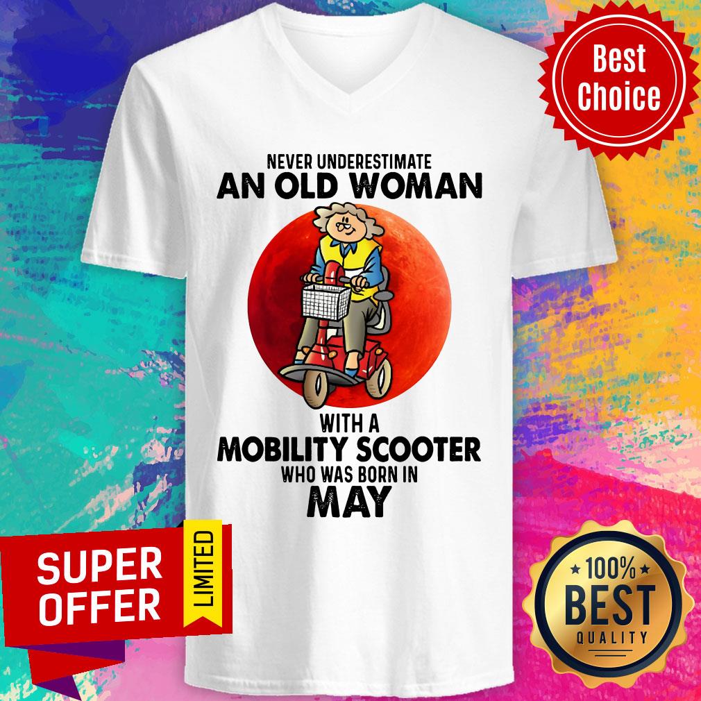 never-underestimate-an-old-woman-with-a-mobility-scooter-who-was-born-in-may-v-neck.jpg