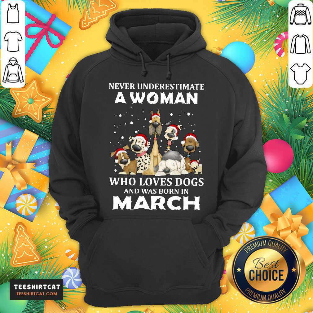 pretty-never-underestimate-a-woman-who-loves-dogs-and-was-born-in-march-christmas-hoodie.jpg