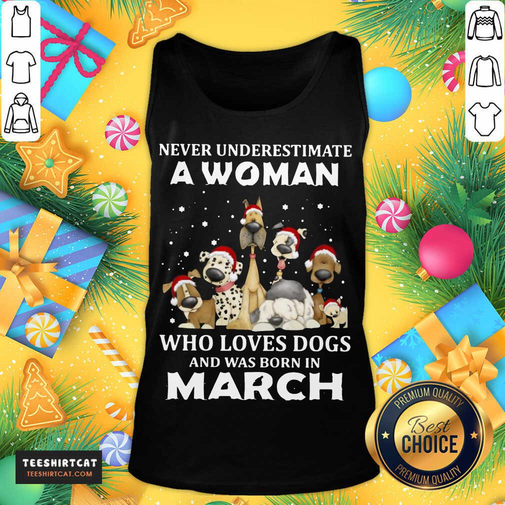 pretty-never-underestimate-a-woman-who-loves-dogs-and-was-born-in-march-christmastank-top.jpg