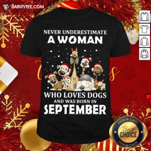 Pretty Never Underestimate A Woman Who Loves Dogs And Was Born In September Christmas Shirt
