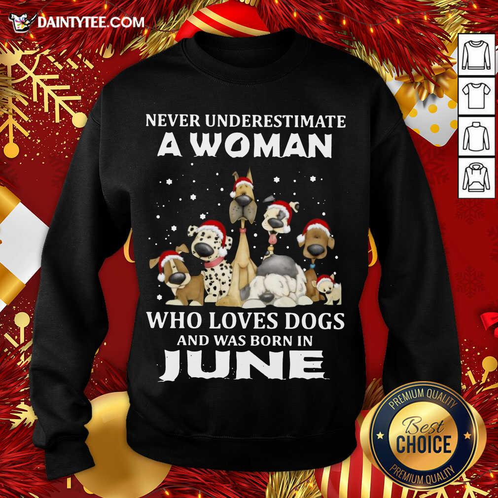 hot-never-underestimate-a-woman-who-loves-dogs-and-was-born-in-june-christmas-sweatshirt.jpg