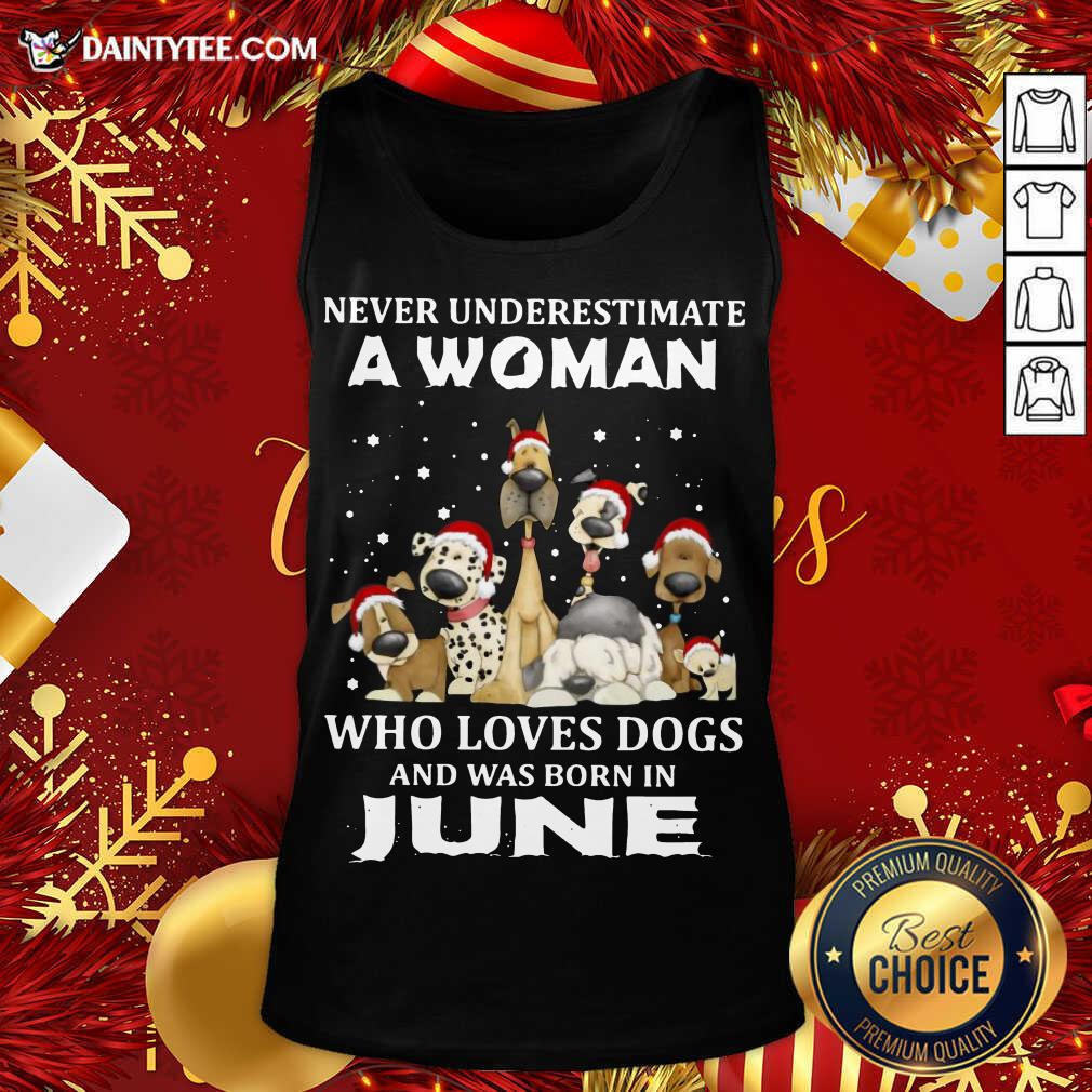 hot-never-underestimate-a-woman-who-loves-dogs-and-was-born-in-june-christmas-tank-top.jpg