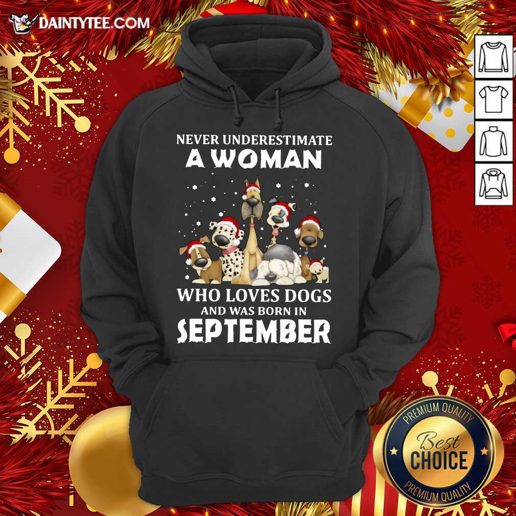 pretty-never-underestimate-a-woman-who-loves-dogs-and-was-born-in-september-christmas-hoodie.jpg