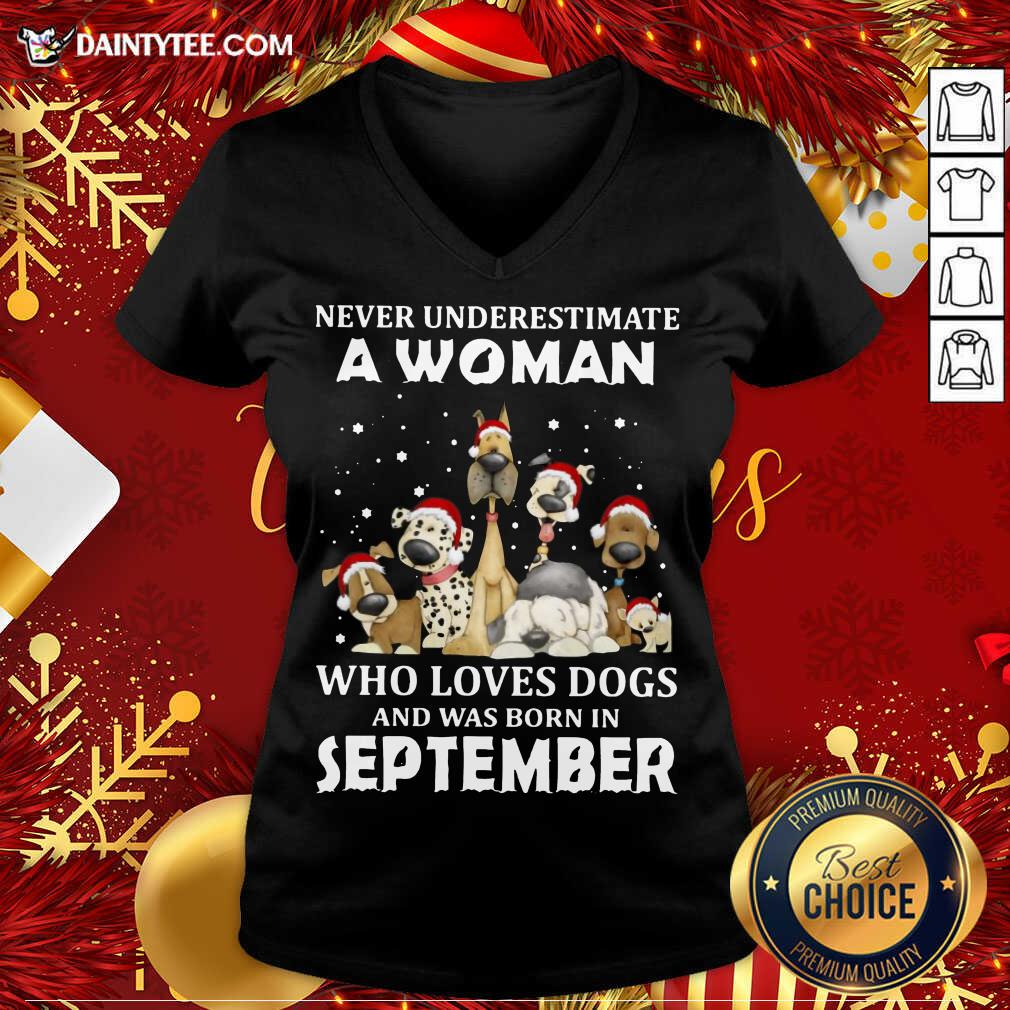 pretty-never-underestimate-a-woman-who-loves-dogs-and-was-born-in-september-christmas-v-neck.jpg