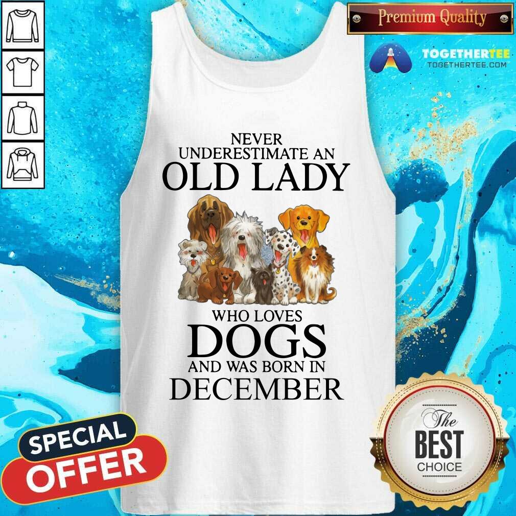 Never Underestimate A Dec Lady Who Loves Dogs Shirt