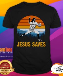 Retro Jesus Saves baseball pitcher t-shirt design with a vibrant sunset background, perfect for sports and faith enthusiasts.