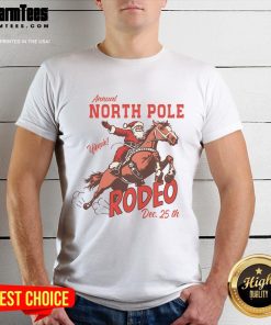 Awesome retro country western Santa on a bucking horse Christmas T-shirt design featuring festive colors and fun holiday spirit.