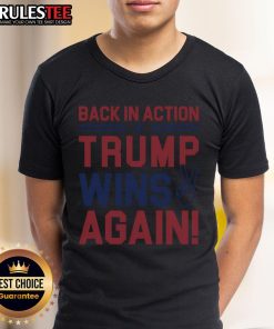 Back In Action Trump Wins Again T-Shirt featuring bold text and patriotic colors, perfect for supporters of Trump.