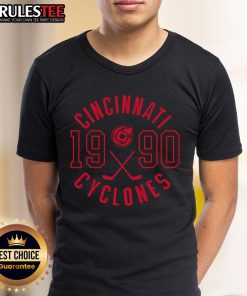 Alt Text: Cincinnati Cyclones 1990 Circle Logo T-Shirt featuring vibrant colors and classic team logo on a stylish tee.