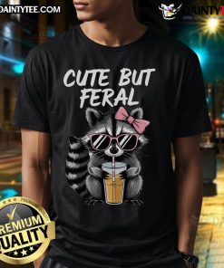 Adorable 'Cute But Feral Raccoon' T-Shirt featuring a playful raccoon graphic, perfect for animal lovers and casual wear.