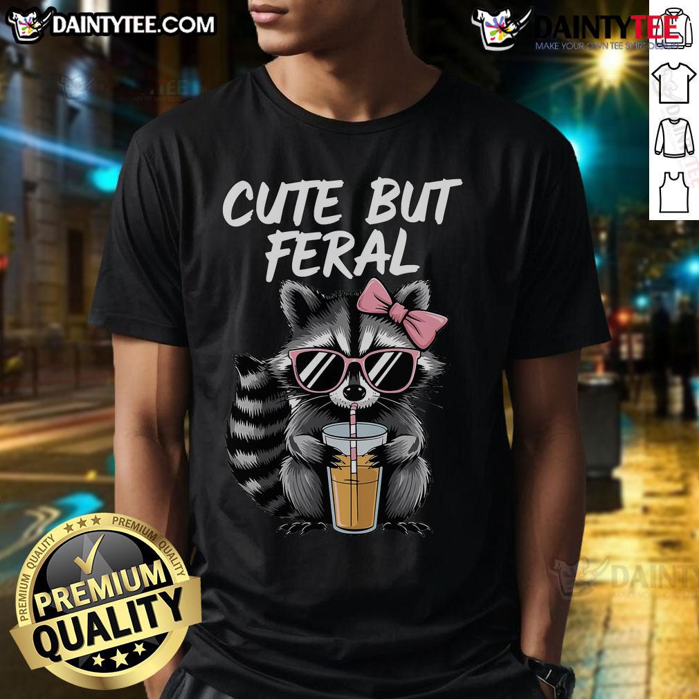 Cute But Feral Raccoon T Shirt Adorable 'Cute But Feral Raccoon' T-Shirt featuring a playful raccoon graphic, perfect for animal lovers and casual wear.