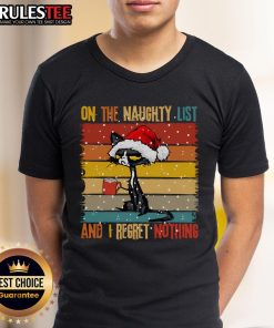 Cute cat wearing a Naughty and I Regret Nothing Christmas T-shirt, perfect for festive feline lovers and holiday fun.
