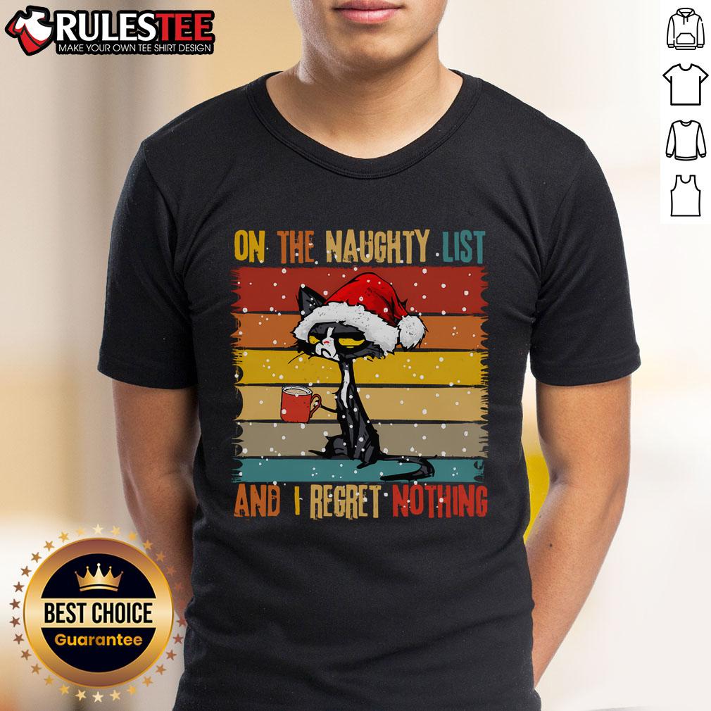 Cute Cat On The List Of Naughty And I Regret Nothing Christmas T Shirt Cute cat wearing a Naughty and I Regret Nothing Christmas T-shirt, perfect for festive feline lovers and holiday fun.