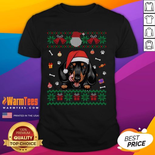 Cute Dachshund dog wearing an ugly Christmas Santa hat on a festive Xmas t-shirt, perfect for holiday celebrations.