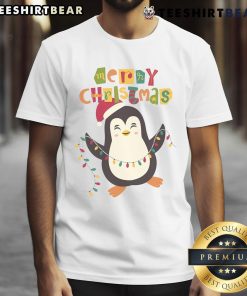 Alt Text: Cute penguin wearing a Santa hat on a Merry Christmas T-shirt, perfect for festive holiday celebrations.