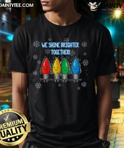 Alt Text: Cute We Shine Christmas Brighter Together T-Shirt featuring colorful lights for festive holiday spirit.