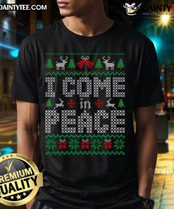 Couple wearing matching 'Funny I Come In Peace' ugly Christmas T-shirts, spreading holiday cheer and humor together.