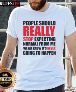 Funny People Should Really Stop Expecting Normal From Me T-Shirt featuring a humorous quote design in vibrant colors.