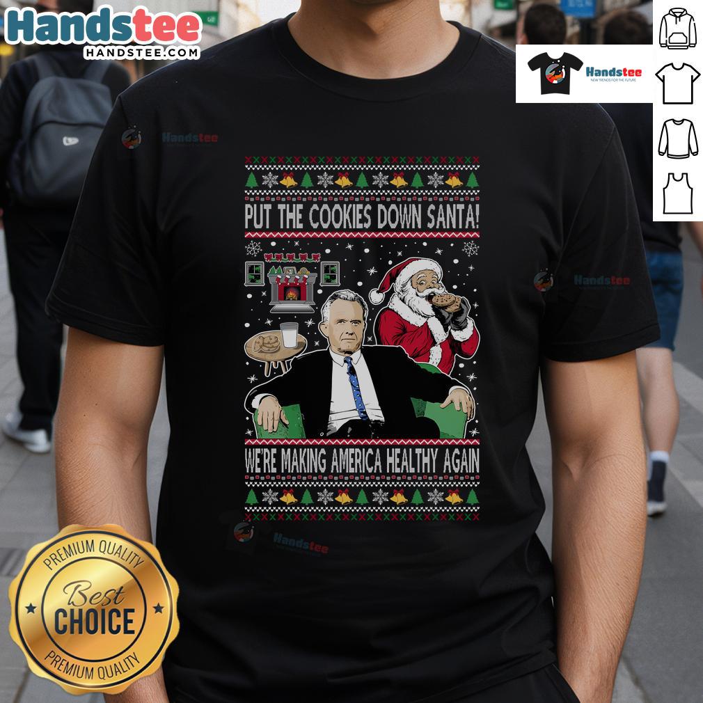 Funny Put The Cookies Down Santa We're Making America Healthy Again Christmas T-Shirt Funny Christmas T-Shirt featuring Santa with 'Put The Cookies Down, We're Making America Healthy Again' slogan.