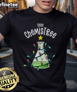 Funny science teacher wearing 'Oh Chemistree' chemistry t-shirt with lab equipment in a classroom setting.