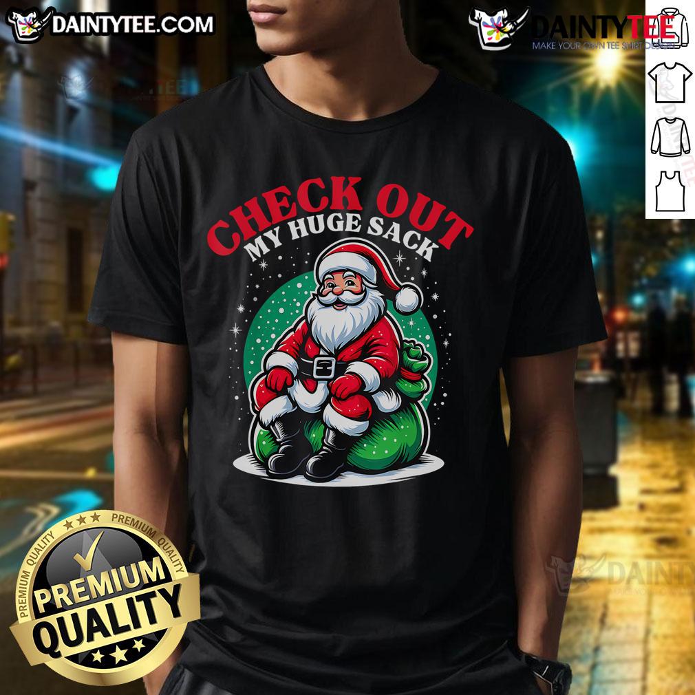 Funny Xmas Check Out My Huge Sack Santa Christmas T Shirt Funny Xmas T-Shirt featuring Santa with a huge sack, perfect for festive celebrations and holiday-themed gatherings.