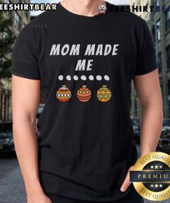 Family party with matching Christmas outfits, featuring a mom-made ornament t-shirt for festive holiday fun.