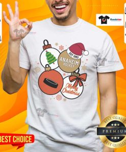 Alt Text: Happy Merry Christmas Anaheim Hockey Est 1993 T-Shirt featuring festive design and team colors for holiday cheer.