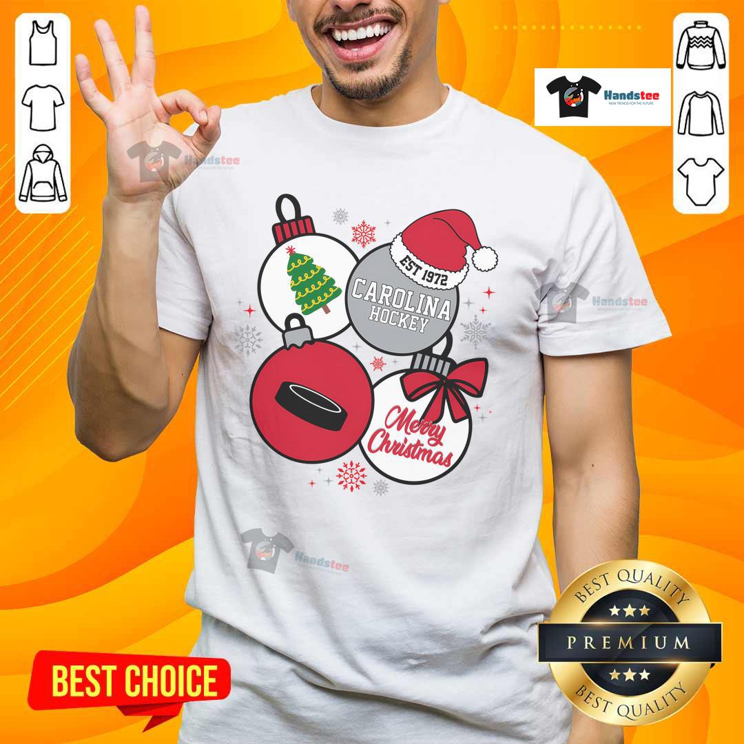 Hot Merry Christmas Carolina Hockey Est 1972 T Shirt Hot Merry Christmas Carolina Hockey Est 1972 T-Shirt design featuring festive graphics and team colors for holiday cheer.