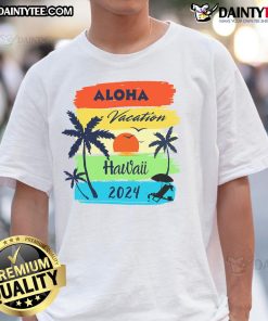 Family wearing 'Nice Aloha Hawaii Tropical Vacation 2024' T-shirt on a sunny beach, enjoying their Hawaiian getaway.