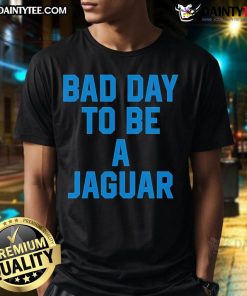 Dan Campbell Detroit Lions T-Shirt: 'Bad Day To Be A Jaguar Coach' design showcasing team spirit and humor.