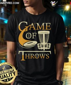 Disc golf player wearing 'Nice Game Of Throws' T-shirt throws a flying disc in a sunny park setting.