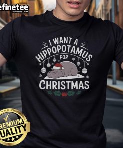 Funny 'I Want A Hippo For Xmas' pajamas t-shirt featuring a cute hippopotamus in festive holiday colors.