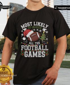 Christmas T-Shirt featuring 'Most Likely To Watch All The Football Games' design for football fans, perfect holiday gift.