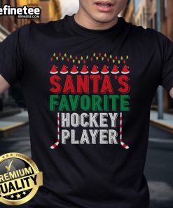 Santa's Favorite Ice Hockey Player Christmas Ornament T-Shirt featuring festive graphics and holiday spirit.