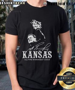 Alt Text: Official Bill Self Kansas All Time Winningest Coach T-Shirt featuring team colors and emblem for loyal fans.