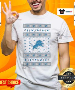 Alt Text: Official Detroit Lions Holiday Christmas T-Shirt featuring festive design and team logo, perfect for fans this season.