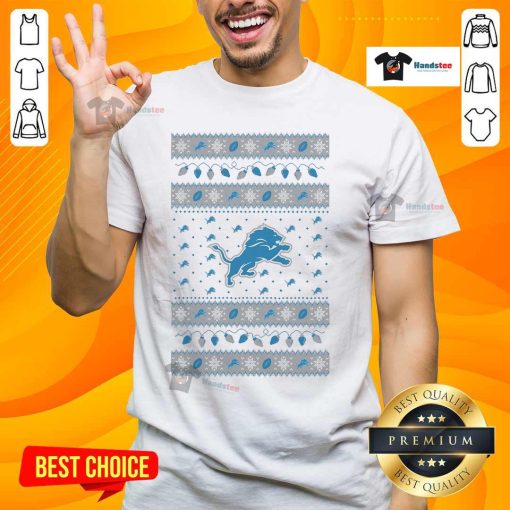 Alt Text: Official Detroit Lions Holiday Christmas T-Shirt featuring festive design and team logo, perfect for fans this season.