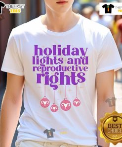 Alt Text: Official Holiday Lights and Reproductive Rights Christmas 2024 T-Shirt showcasing festive design and advocacy message.