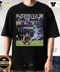 Official Jake Bates Jesus Take The Heel T-Shirt featuring bold graphics and a stylish design for faith-inspired fashion.