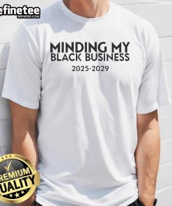 Alt Text: Official Minding My Black Business 2025-2029 T-Shirt featuring bold text and a stylish design for empowerment.