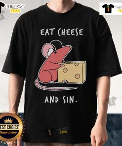 Alt Text: Official Pirate Software employee wearing Eat Cheese And Sin T-shirt, showcasing playful company culture and branding.