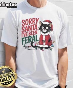 Funny 'Sorry Santa Ive Been Feral' Christmas T-Shirt featuring a cute Santa cat design for the 2024 holiday season.