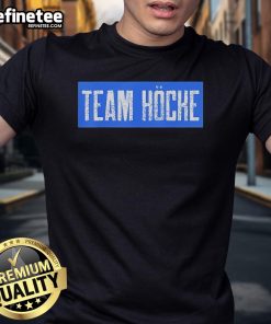 Official Team Hockey T-Shirt featuring bold logo and vibrant colors, perfect for fans and players alike.