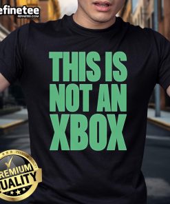 Alt Text: Official This Is Not An Xbox T-Shirt featuring a humorous design, perfect for gamers and fans of gaming culture.