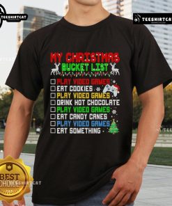Official Xmas Bucket List T-Shirt featuring Santa playing video games and enjoying Christmas festivities.