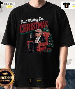 Premium Just Waiting For Christmas Trimp T-Shirt featuring festive design and comfortable fit for holiday celebrations.